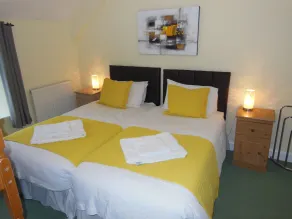 Y Giler Arms - Habitación