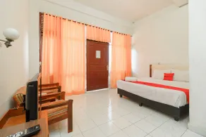 RedDoorz @ Tuktuk Danau Toba - Chambre