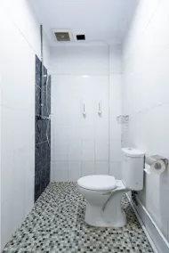 Hotel O Helvetia Residence - Bathroom