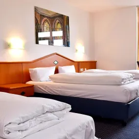 Palazzo Hotel - direkt im Zentrum - Chambre