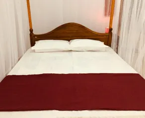 New Toropi Homestay - Room