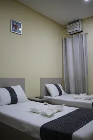 Rusville Hotel & Residences - Chambre