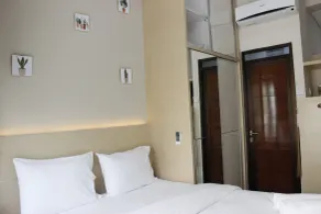 Homey Studio Gateway Pasteur Apartment near Exit Toll By Travelio - Zimmer