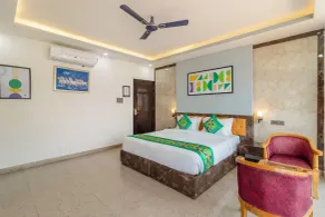 Treebo Arya Palace With Swimming Pool - Chambre
