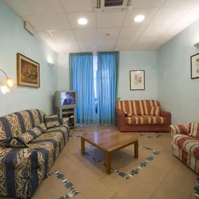Hotel Savina - Coin salon dans le hall
