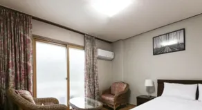 Namwon Hotel - Zimmer