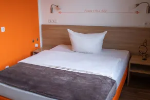 Orange Hotel und Apartments - Chambre