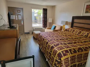 Studio 9 Inn & Suites - Chambre