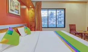 Treebo Suraksha Inn - Room