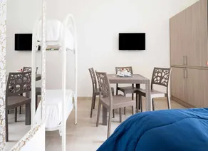 Monolocale Vela Nuovo con Wi-Fi, Clima e Giardino a Torre Lapillo - Camera