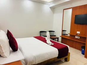 Hotel Starfinch Inn - Habitación