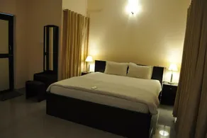 Jyothi Suites - Chambre