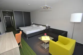 Buly Aréna - Habitación