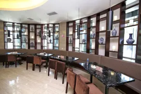 Baolong Homelike Hotel Changxing Branch - Restaurant