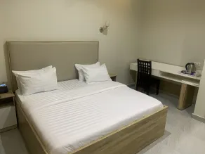 Greywood Hotel and Apartments - Habitación