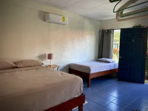 Rooms & Pool Macaws - Habitación