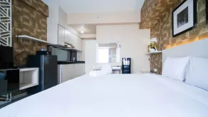 Modern and Cozy Stay Studio Apartment at Tanglin Supermall Mansion By Travelio - Zimmer