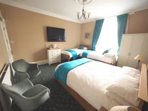 Cowrie Guest House - Chambre