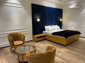 Mangalam Inn By AAA Grand - Habitación