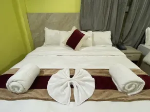 Hotel Kavya Inn - Habitación