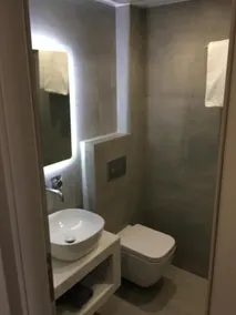 Olympos Suites Apartments - Bad