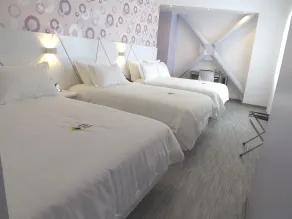 Luma Plaza Hotel - Chambre