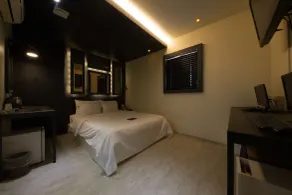 Achasan Station Wall Hotel - Chambre