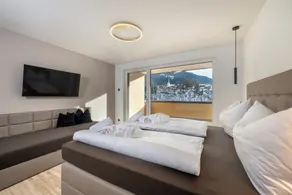 Studio convivial et familial avec sauna, piscine et terrasse | Adapté au travail à distance - Vue de la chambre