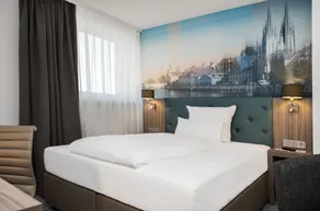 Atrium im Park Hotel Regensburg - Vue de la chambre