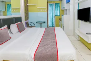 Hotel O Ciputat Near Apartment Green Lake View Ciputat - Room