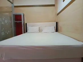 Hotel O Wisma Syariah Lahundape - Habitación