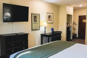 Grander Inn & Suites by IHG - Zimmer