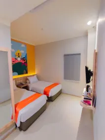 Front One Budget Waena Abepura - Chambre