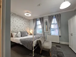 Ambassador Guest House - Habitación