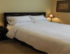 Balsam Suites Boutique Inn & Residence - Chambre