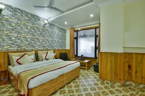 The Posh Hotel near Mall Road with Hassle Free Covered Parking - Room