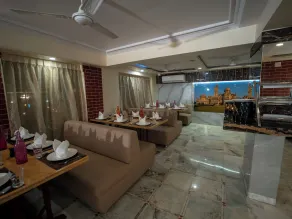 Hotel Pravasa Stay - Restaurang