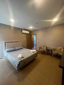 Joi Suites Hotel - Chambre