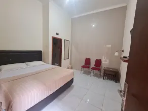 OYO Life Arjuna Guest House Syariah - Habitación