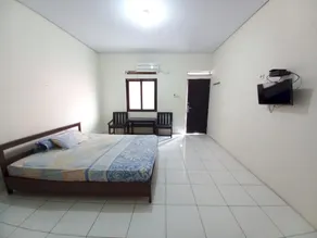 Hotel O Perbetulan Guest House Syariah - Habitación