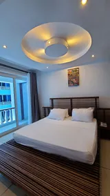 Cowrie Shell Beach Apartments Official - Zimmer