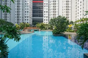 Beautiful 2BR with Direct Access to Pool Green Bay Pluit Apartment By Travelio - Pool