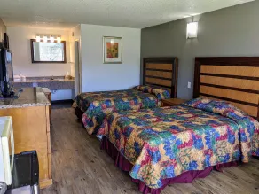 Garden Inn & Suites - Chambre