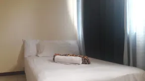 EKONUMI ROOMS at Moonwalk Paranaque - Chambre