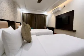 Hotel Mango Groves - Habitación