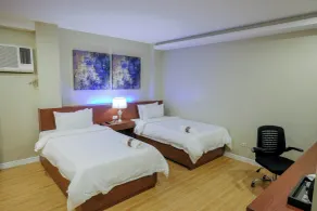Ambien's Place Residential Hotel - Zimmer