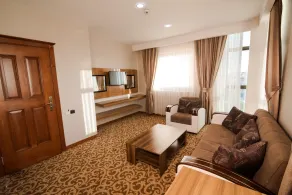 Grand Hotel & Convention Center Karman - Habitación
