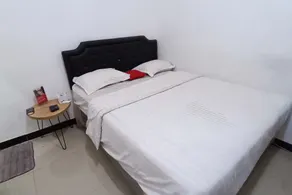 Hotel O D'harjo Guesthouse - Habitación