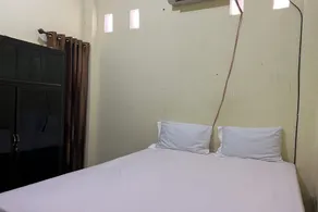 Hotel O Kost Naura - Habitación