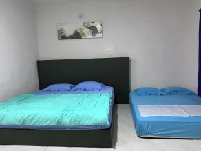 Hotel O Sri Ayu Inn - Zimmer